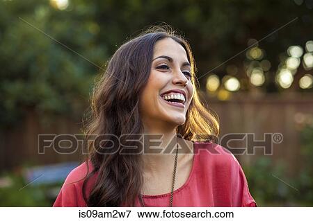 Portrait of young woman with wide smile View Large Photo Image Stock Photo - Portrait of young woman with wide smile. Fotosearch