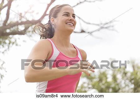 Runner on the go View Large Photo Image Picture - Runner on the go. Fotosearch