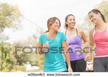 Stock Image - Runners on the go. Fotosearch