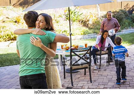 Three generation family in garden View Large Photo Image Stock Image - Three generation family in garden. Fotosearch
