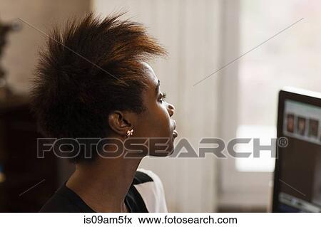 Stock Photo - "Woman working at computer, home office". Fotosearch