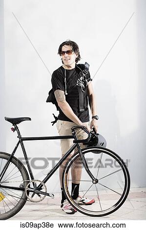 Bike messenger with bike View Large Photo Image Stock Image - Bike messenger with bike. Fotosearch