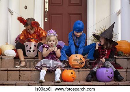 Children enjoying treats on steps View Large Photo Image Stock Image - Children enjoying treats on steps. Fotosearch