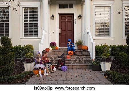 Children enjoying treats on steps View Large Photo Image Stock Photography - Children enjoying treats on steps. Fotosearch