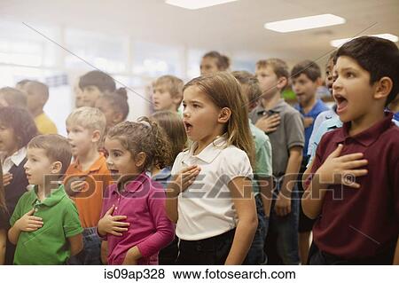 Children reciting Pledge of Allegiance in school View Large Photo Image Stock Photo - Children reciting Pledge of Allegiance in school. Fotosearch