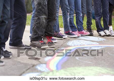 Children standing in a row outdoors View Large Photo Image Stock Photograph - Children standing in a row outdoors. Fotosearch