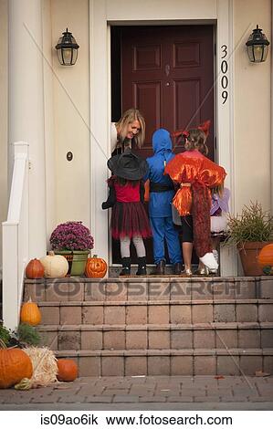 Stock Image - Children trick or treating. Fotosearch