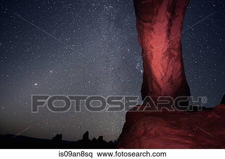 "Column rock formation and starry night sky, Arches National Park, Moab, Utah, USA" View Large Photo Image Stock Photography - "Column rock formation and starry night sky, Arches National Park, Moab, Utah, USA". Fotosearch