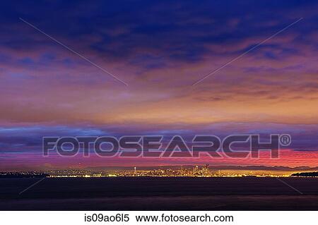 "Distant view of city lights over Puget Sound at night, Seattle, Washington State, USA" View Large Photo Image Stock Photography - "Distant view of city lights over Puget Sound at night, Seattle, Washington State, USA". Fotosearch