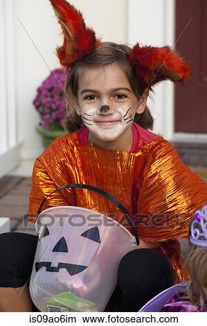 Girl with Jack O' Lantern bucket on steps View Large Photo Image Picture - Girl with Jack O' Lantern bucket on steps. Fotosearch