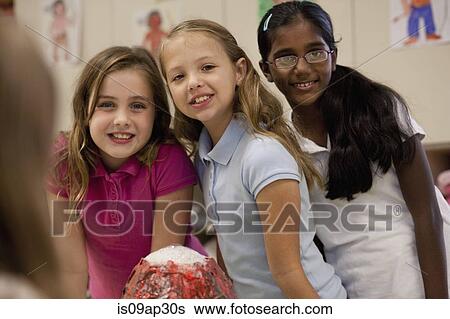 Girls with volcano model in classroom View Large Photo Image Stock Photograph - Girls with volcano model in classroom. Fotosearch