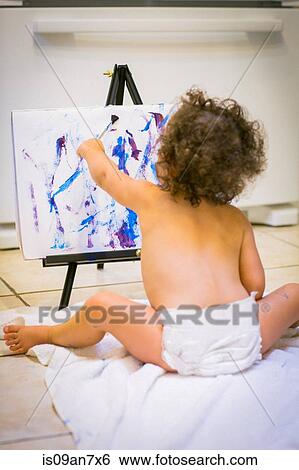 Little girl painting in kitchen View Large Photo Image Stock Photograph - Little girl painting in kitchen. Fotosearch