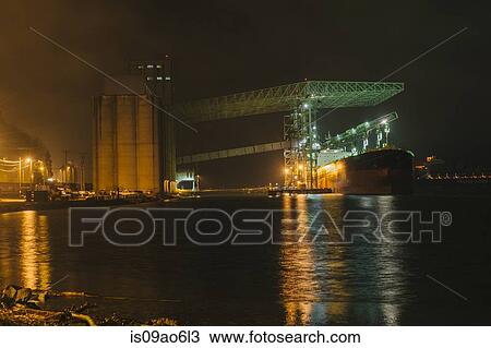 Stock Image - "Oil tanker on Puget Sound at night, Tacoma, Washington State, USA". Fotosearch