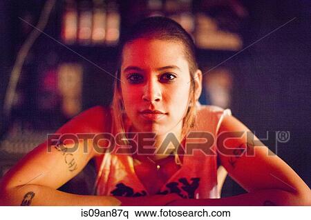 Stock Photography - "Portrait of punk girl, resting on arms". Fotosearch