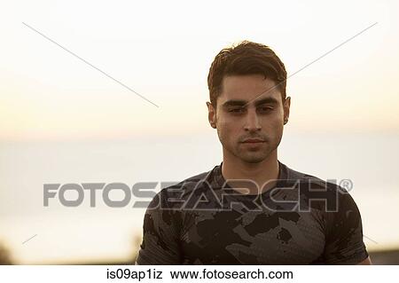 "Portrait of young man, outdoors" View Large Photo Image Stock Photo - "Portrait of young man, outdoors". Fotosearch