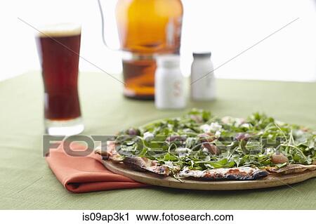 Still life of cheese and rocket pizza View Large Photo Image Stock Image - Still life of cheese and rocket pizza. Fotosearch