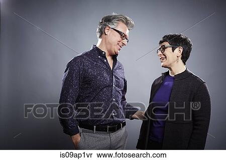 Studio portrait of mature couple face to face View Large Photo Image Stock Photography - Studio portrait of mature couple face to face. Fotosearch