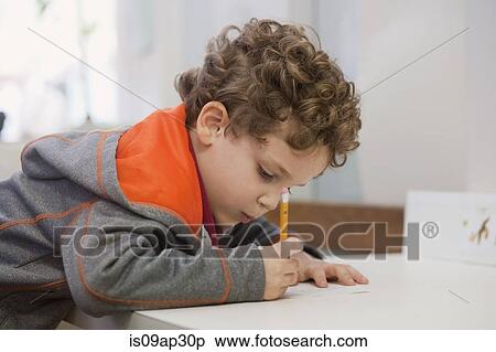 Toddler writing in classroom View Large Photo Image Stock Photography - Toddler writing in classroom. Fotosearch