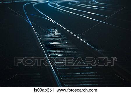 "Train tracks at night, Seattle, USA" View Large Photo Image Stock Image - "Train tracks at night, Seattle, USA". Fotosearch