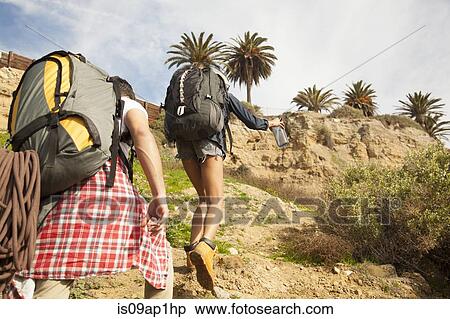 Two friends on trek together View Large Photo Image Stock Photography - Two friends on trek together. Fotosearch