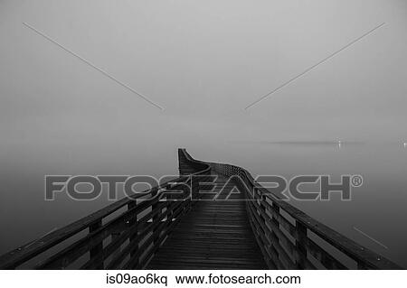 "View of winding wooden pier over misty Puget Sound, Seattle, Washington State, USA" View Large Photo Image Stock Photography - "View of winding wooden pier over misty Puget Sound, Seattle, Washington State, USA". Fotosearch