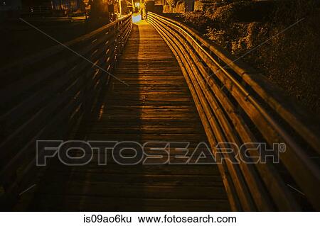 Stock Photograph - "Wooden pier on Puget Sound waterfront, Seattle, Washington State, USA". Fotosearch