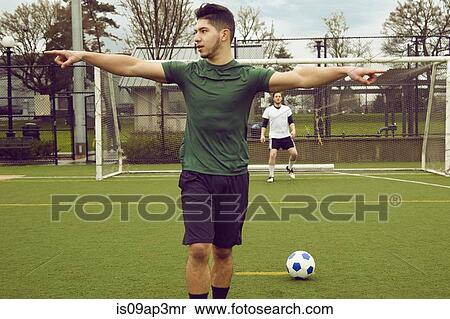 Young male soccer player preparing to take a penalty View Large Photo Image Stock Photography - Young male soccer player preparing to take a penalty. Fotosearch
