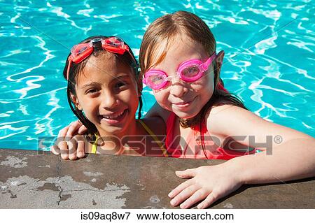 Best friends at poolside View Large Photo Image Stock Photo - Best friends at poolside. Fotosearch