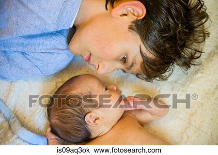 Big brother with baby brother View Large Photo Image Stock Image - Big brother with baby brother. Fotosearch