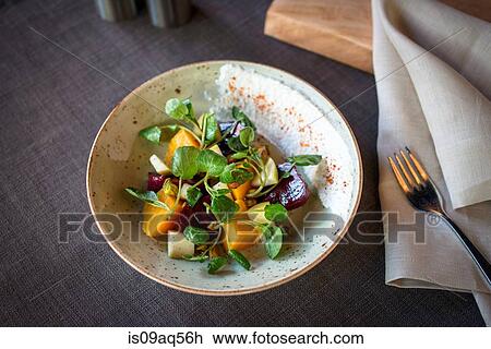 Bowl of salad with beetroot on restaurant table View Large Photo Image Stock Image - Bowl of salad with beetroot on restaurant table. Fotosearch