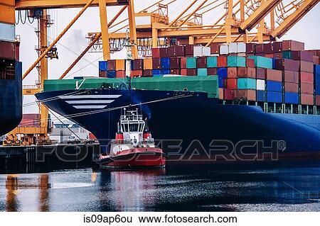 "Container ship and tugboat in harbor, Tacoma, Washington, USA" View Large Photo Image Stock Photograph - "Container ship and tugboat in harbor, Tacoma, Washington, USA". Fotosearch