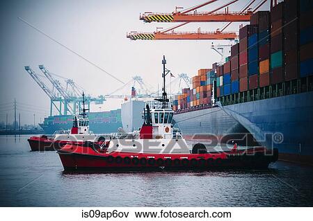 "Container ship and tugboats in harbor, Tacoma, Washington, USA" View Large Photo Image Stock Photo - "Container ship and tugboats in harbor, Tacoma, Washington, USA". Fotosearch