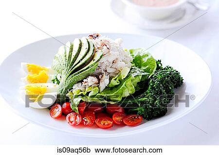 Stock Image - Crab louie salad on restaurant table. Fotosearch
