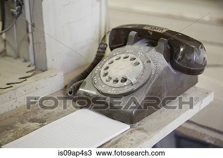 Dusty old telephone on shelf in cabinet makers workshop View Large Photo Image Stock Image - Dusty old telephone on shelf in cabinet makers workshop. Fotosearch
