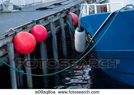 "Fishing boat by dock, Reine, Norway" View Large Photo Image Stock Image - "Fishing boat by dock, Reine, Norway". Fotosearch