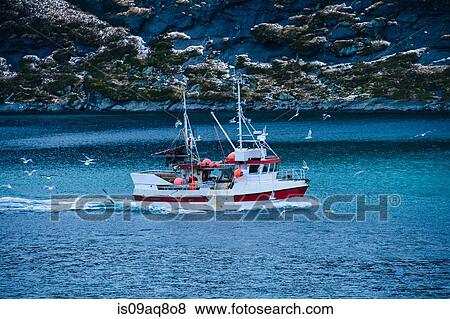 Stock Photo - "Fishing boat on sea, Reine, Norway". Fotosearch