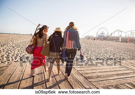 "Friends walking, Santa Monica Pier, Santa Monica Beach, US" View Large Photo Image Stock Image - "Friends walking, Santa Monica Pier, Santa Monica Beach, US". Fotosearch