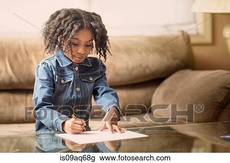 Girl drawing on coffee table View Large Photo Image Stock Image - Girl drawing on coffee table. Fotosearch