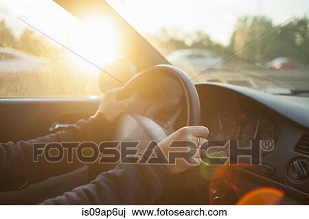 Hands of woman on car steering wheel View Large Photo Image Stock Image - Hands of woman on car steering wheel. Fotosearch