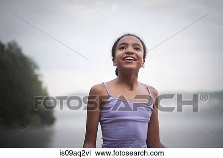 "Happy girl on summer vacation at Lake George, New York, USA" View Large Photo Image Stock Image - "Happy girl on summer vacation at Lake George, New York, USA". Fotosearch
