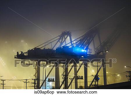 "Misty view of harbor cranes at night, Seattle, Washington, USA" View Large Photo Image Stock Photography - "Misty view of harbor cranes at night, Seattle, Washington, USA". Fotosearch