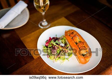 Plate of fried shrimp poboy sandwich on restaurant table View Large Photo Image Stock Photography - Plate of fried shrimp poboy sandwich on restaurant table. Fotosearch