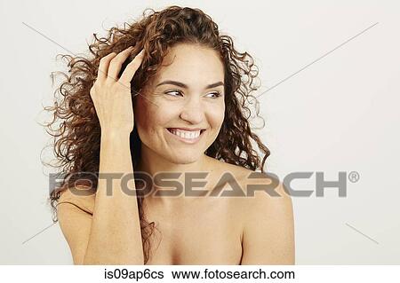 Portrait of brunette woman with ringlets View Large Photo Image Stock Photograph - Portrait of brunette woman with ringlets. Fotosearch