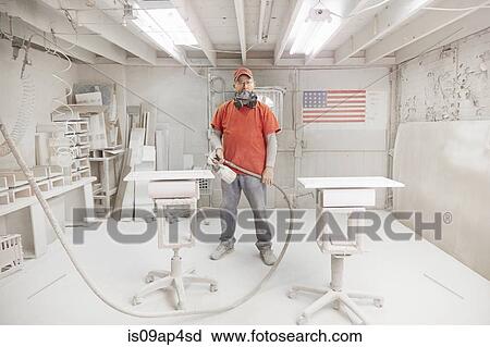 Portrait of cabinet maker with spray gun in workshop spray booth View Large Photo Image Stock Image - Portrait of cabinet maker with spray gun in workshop spray booth. Fotosearch