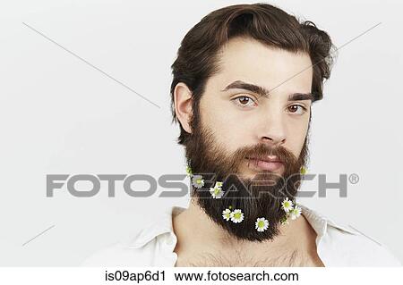 Portrait of man with flowers in beard View Large Photo Image Stock Image - Portrait of man with flowers in beard. Fotosearch