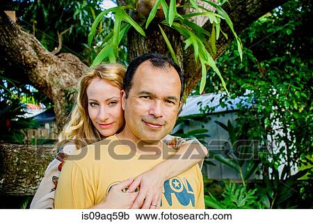 Portrait of mature couple in garden View Large Photo Image Stock Image - Portrait of mature couple in garden. Fotosearch