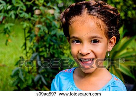 Portrait of pretty girl in garden View Large Photo Image Stock Photo - Portrait of pretty girl in garden. Fotosearch
