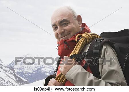 Portrait of senior male mountain climber View Large Photo Image Stock Photo - Portrait of senior male mountain climber. Fotosearch