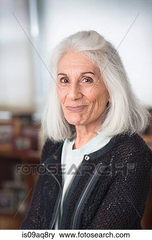 Portrait of smiling senior woman View Large Photo Image Stock Photo - Portrait of smiling senior woman. Fotosearch