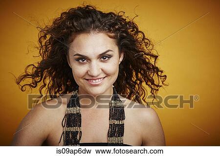Portrait of woman wearing beaded necklace View Large Photo Image Stock Photo - Portrait of woman wearing beaded necklace. Fotosearch
